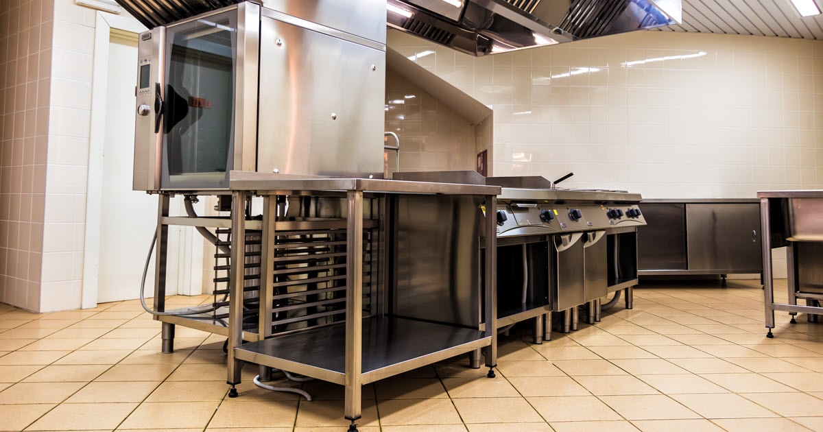 Commercial kitchen with ceramic tile flooring.