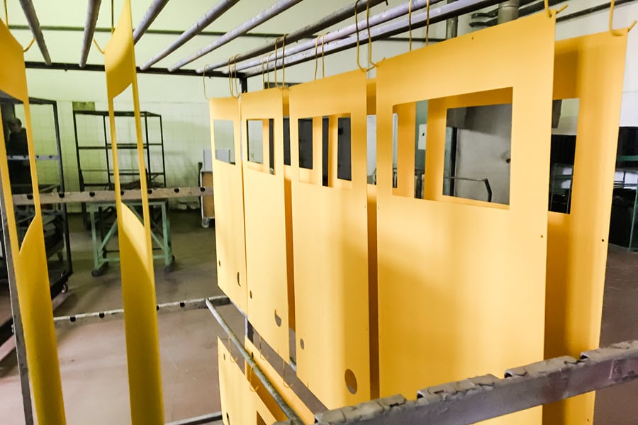 Metal powder coated in yellow compound.